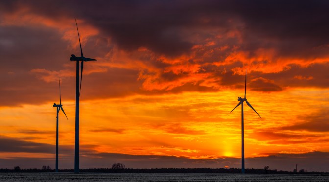 Sunset in Motion: Wind Power at Dusk