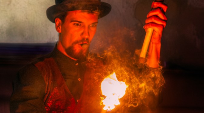 Fire performer entertaining the crowd during the Light Move Festival 2025 in Łódź