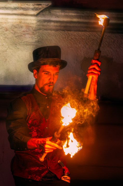 Fire performer entertaining the crowd during the Light Move Festival 2025 in Łódź