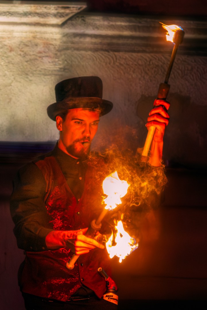 Fire performer entertaining the crowd during the Light Move Festival 2025 in Łódź
