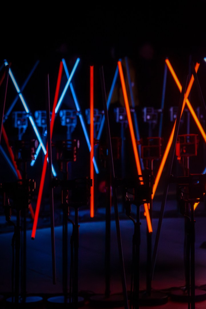 Neon light tubes installation in red and blue at Light Move Festival 2025