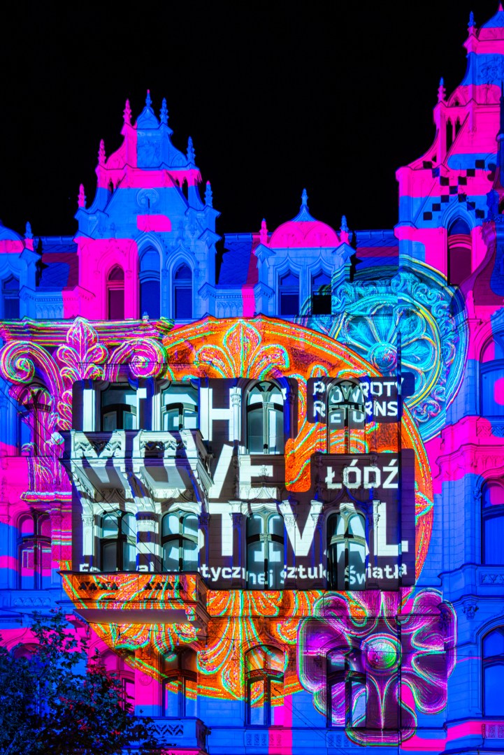 Light Move Festival 2025 logo projection on a building in Łódź