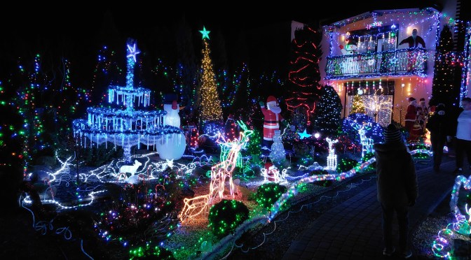 Overall view of Polish Las Vegas in Sieradz with dense Christmas lights and winter decorations after dark