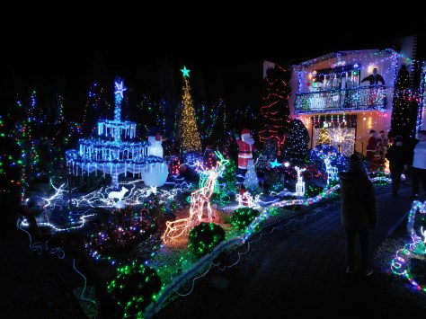 Overall view of Polish Las Vegas in Sieradz with dense Christmas lights and winter decorations after dark